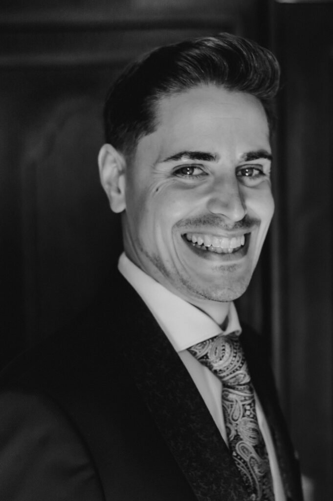 Portrait of an elegant young man in black and white